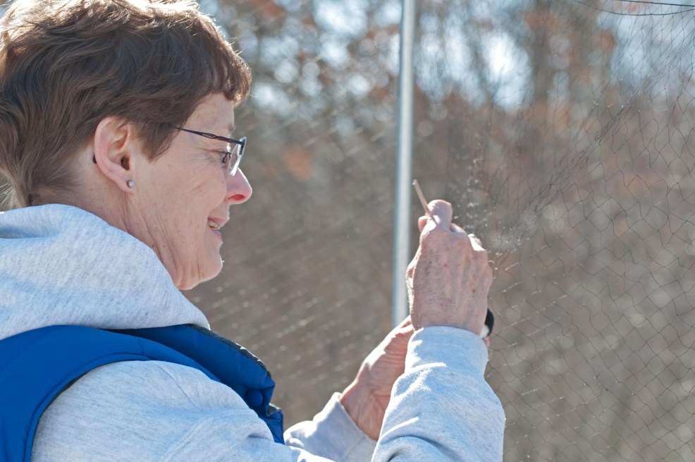 Name:  Karen removing a chickadee from the net 3-30-11.jpg
Views: 271
Size:  133.5 KB